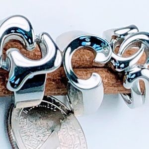 Three Silver Plated Rings Size 7; Freeform Style.